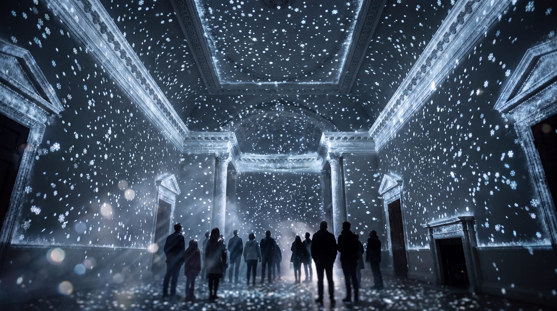 Snow falling the full depth of a colonnaded hall, the room white with particles