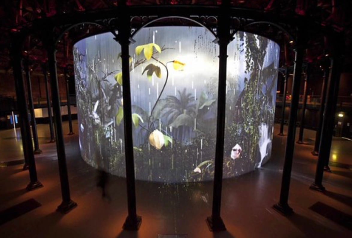 A cylindrical projection drum inside a Victorian pavilion